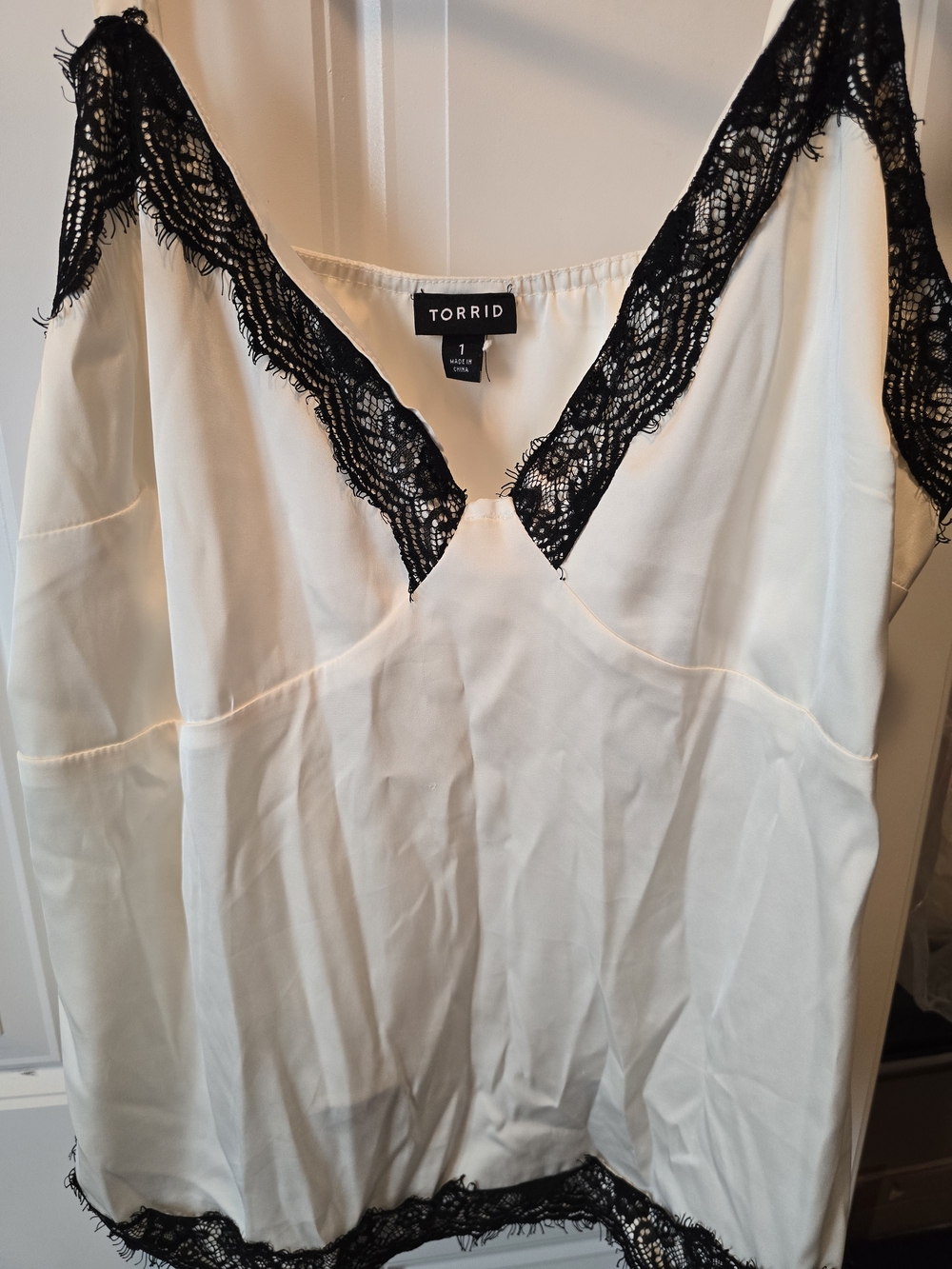 torrid ivory chemise with black lace trim